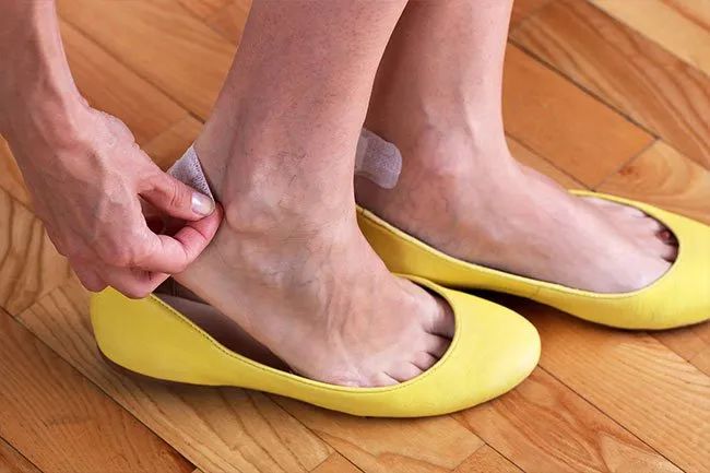 If my new leather shoes rub against my heels?