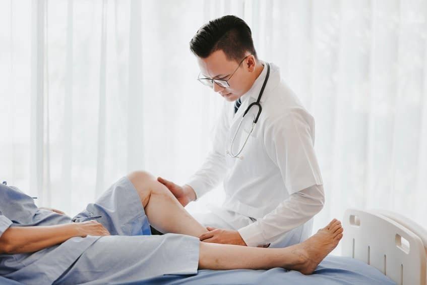 Why is leg elevation more important than dressing changes for venous ulcers?
